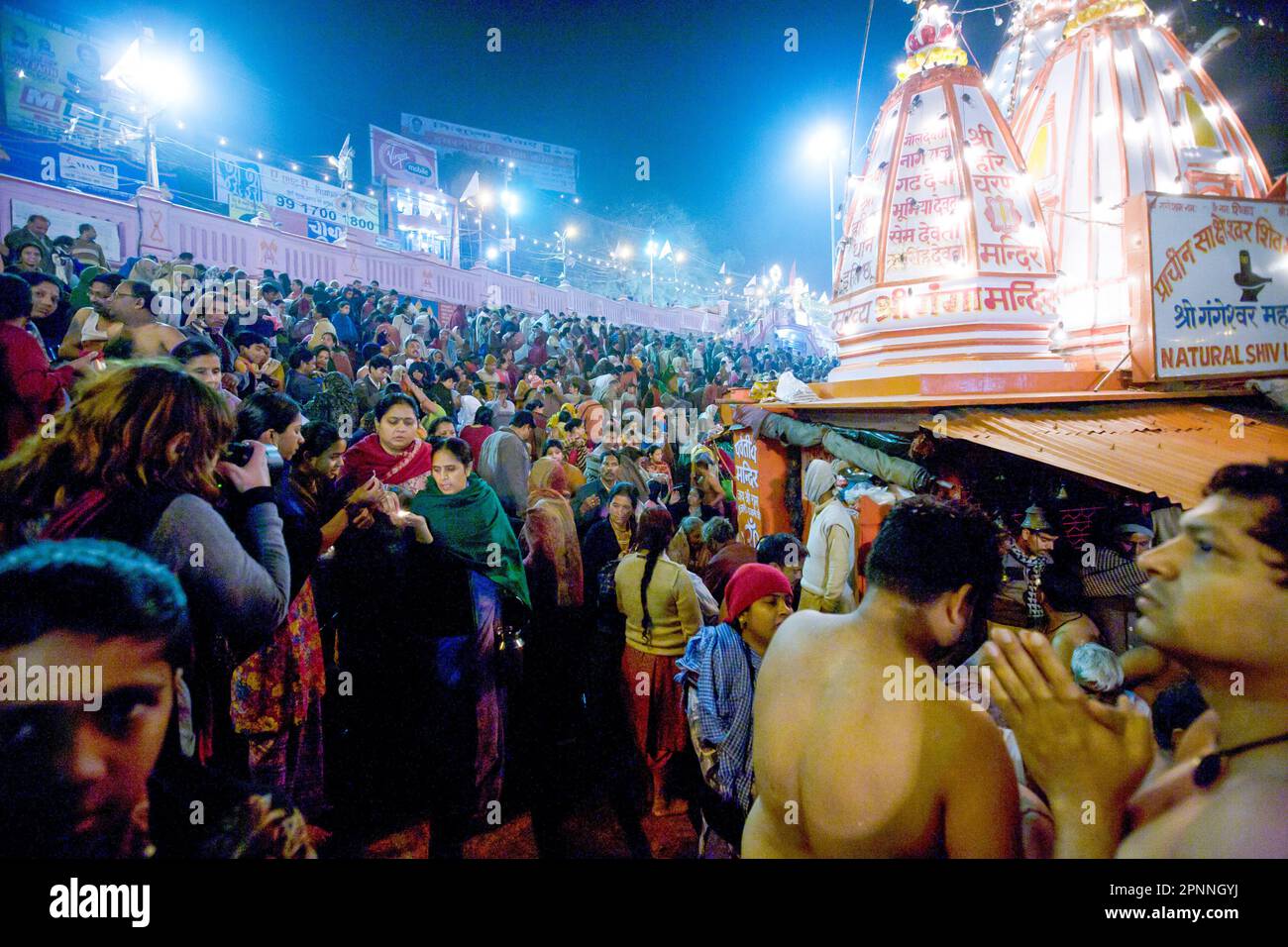 Kumbh Mela, Haridwar. Devotees taking a dip in the Holy River Ganges. Stock Photo