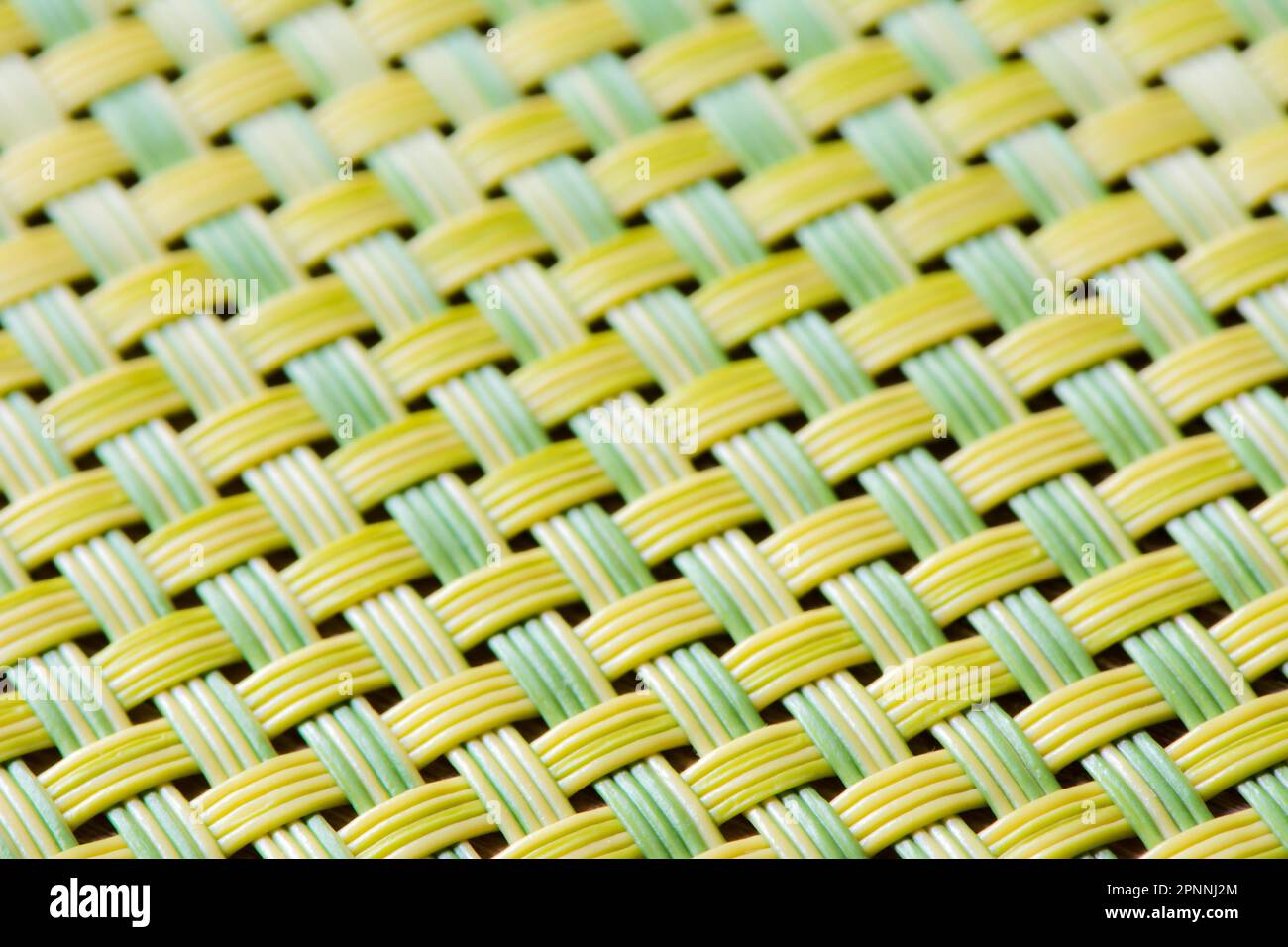 Macro of an abstract table mat background with shallow depth of field Stock Photo