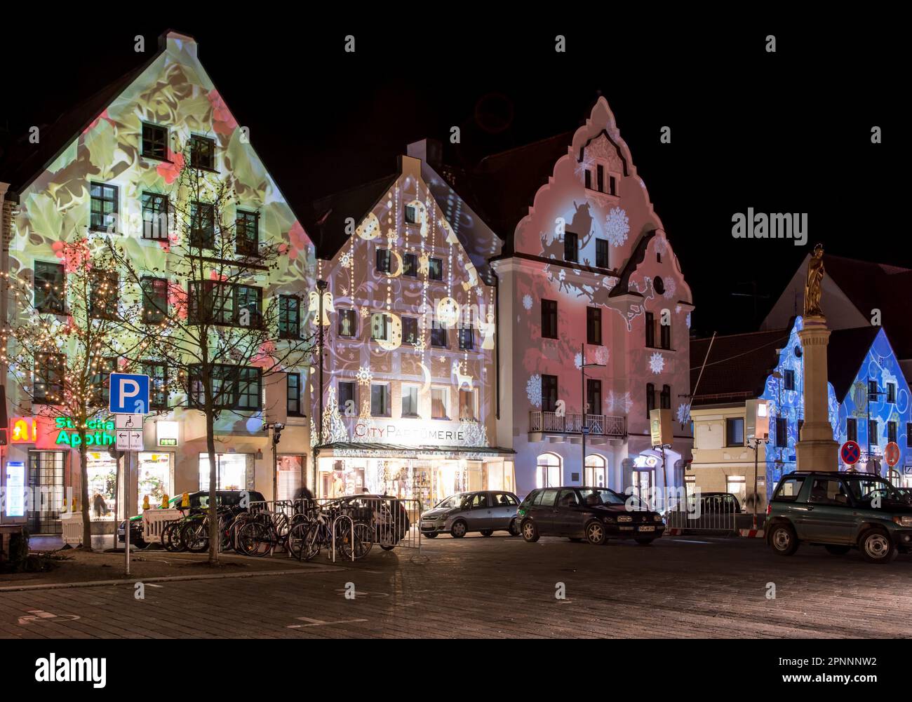 PFAFFENHOFEN, GERMANY - DECEMBER 21: Illuminated house facades in Pfaffenhofen, Germany on December 21, 2014. In the Advent all houses of the old Stock Photo