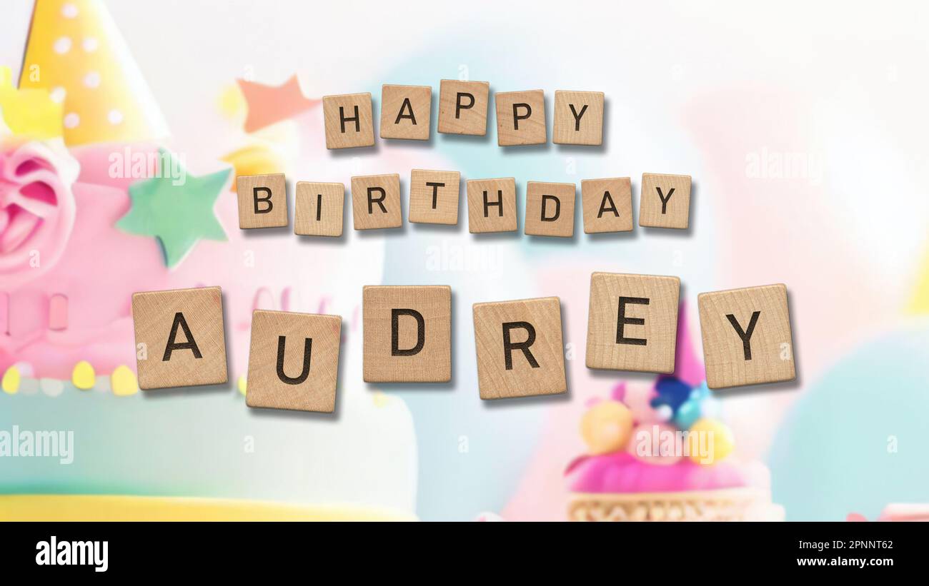 Happy Birthday Audrey card with wooden tiles text. Girls birthday card