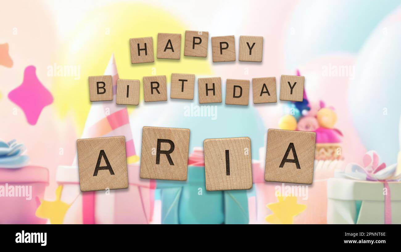 Happy Birthday Aria card with wooden tiles text. Girls birthday card