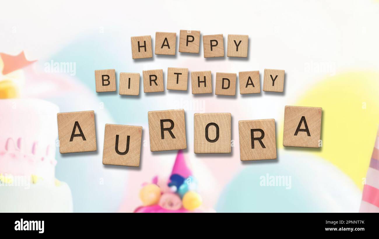 Happy Birthday Aurora card with wooden tiles text. Girls birthday card