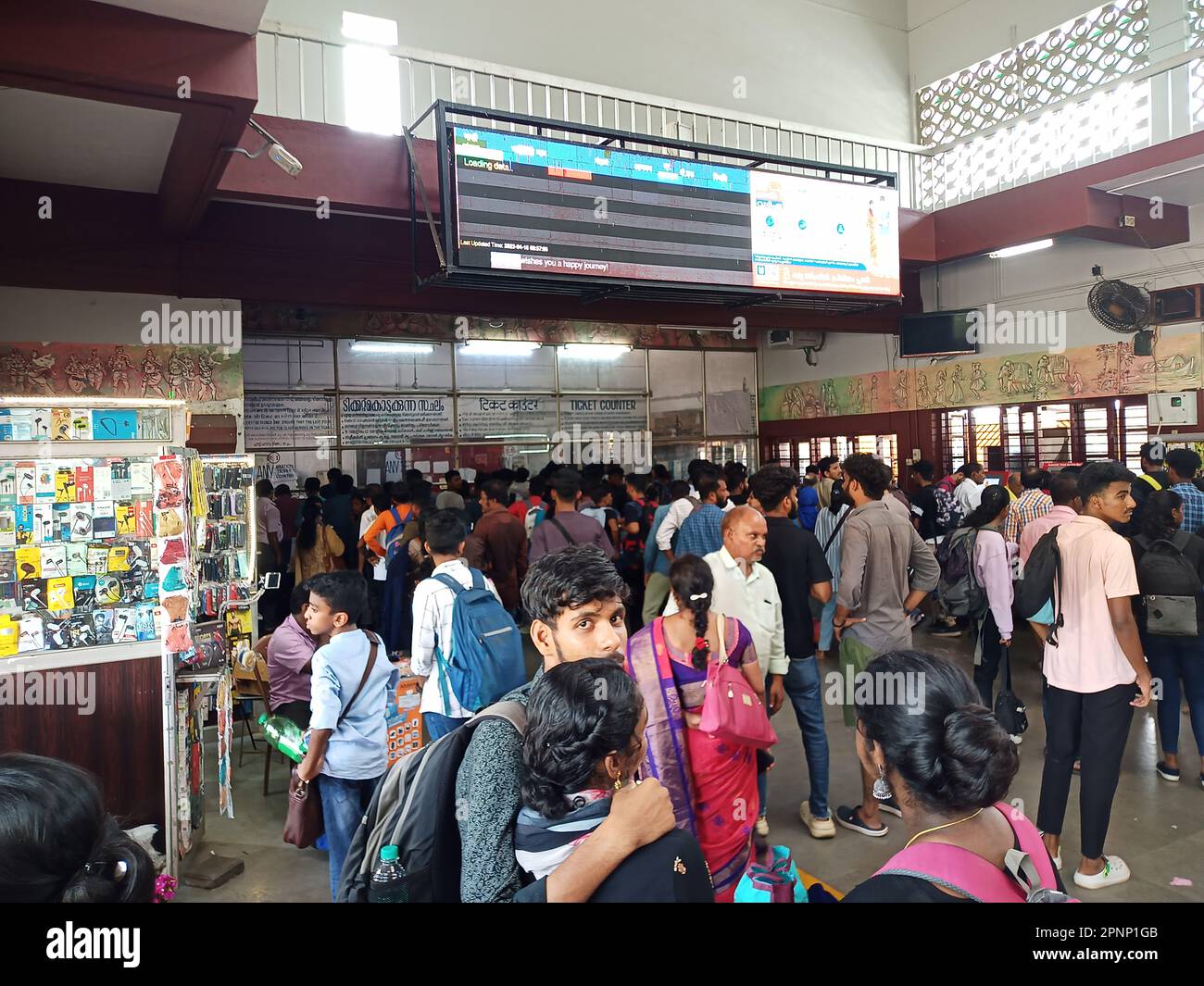indian railways train station,indian train,thrissur railway station,rail,travel,railway transport in india,india,indian railway station,crowd,commute Stock Photo