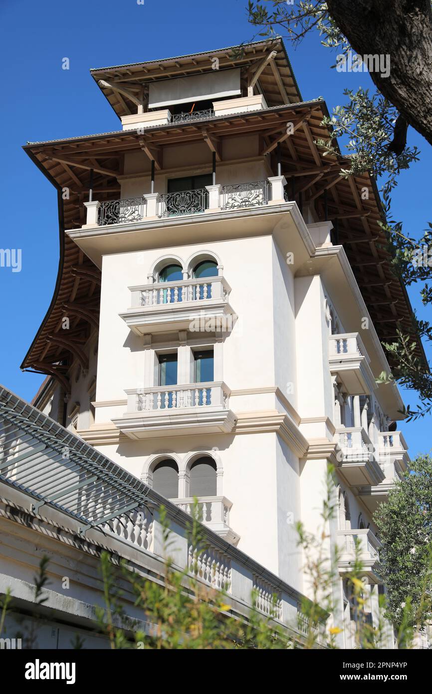 Lowangle view of an original, spacious, and luxurious white house in