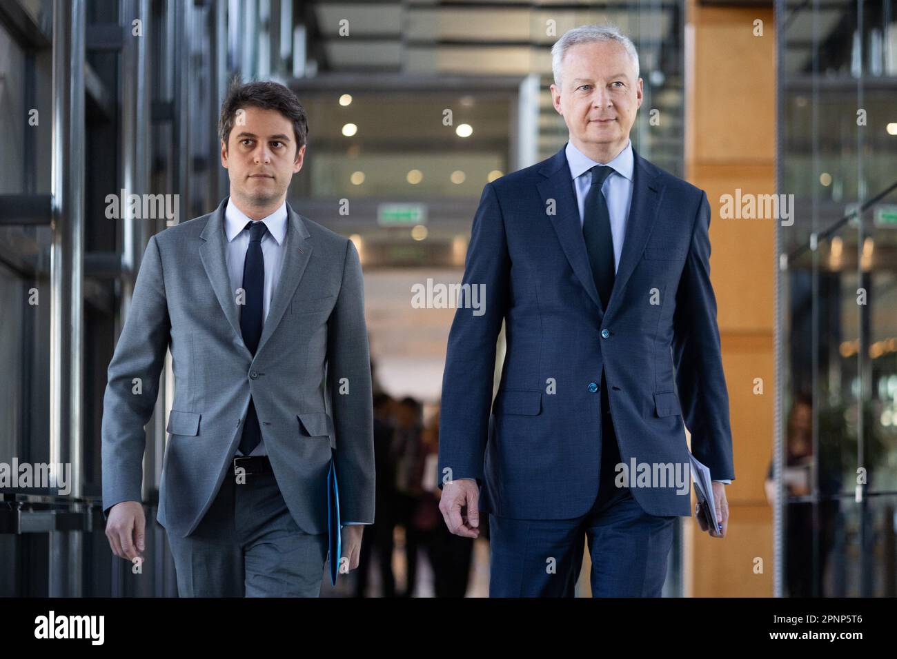 Paris, France. 20th Apr, 2023. Paris, France. 20th Apr, 2023. French Junior Minister for Public Accounts Gabriel Attal and French Finance Minister Bruno Le Maire arrive at a press conference to present the stability pact for France debt in Paris, France, 20 April 2023. Photo by Raphael Lafargue/ABACAPRESS.COM Credit: Abaca Press/Alamy Live News Stock Photo