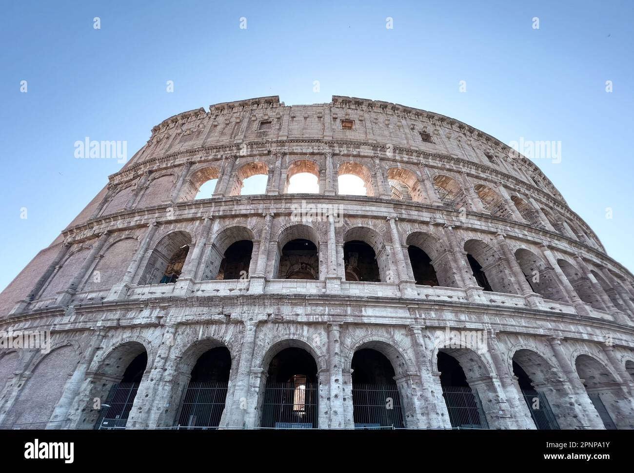 A view of the iconic Colosseum in Rome, Italy, captured from below a ...