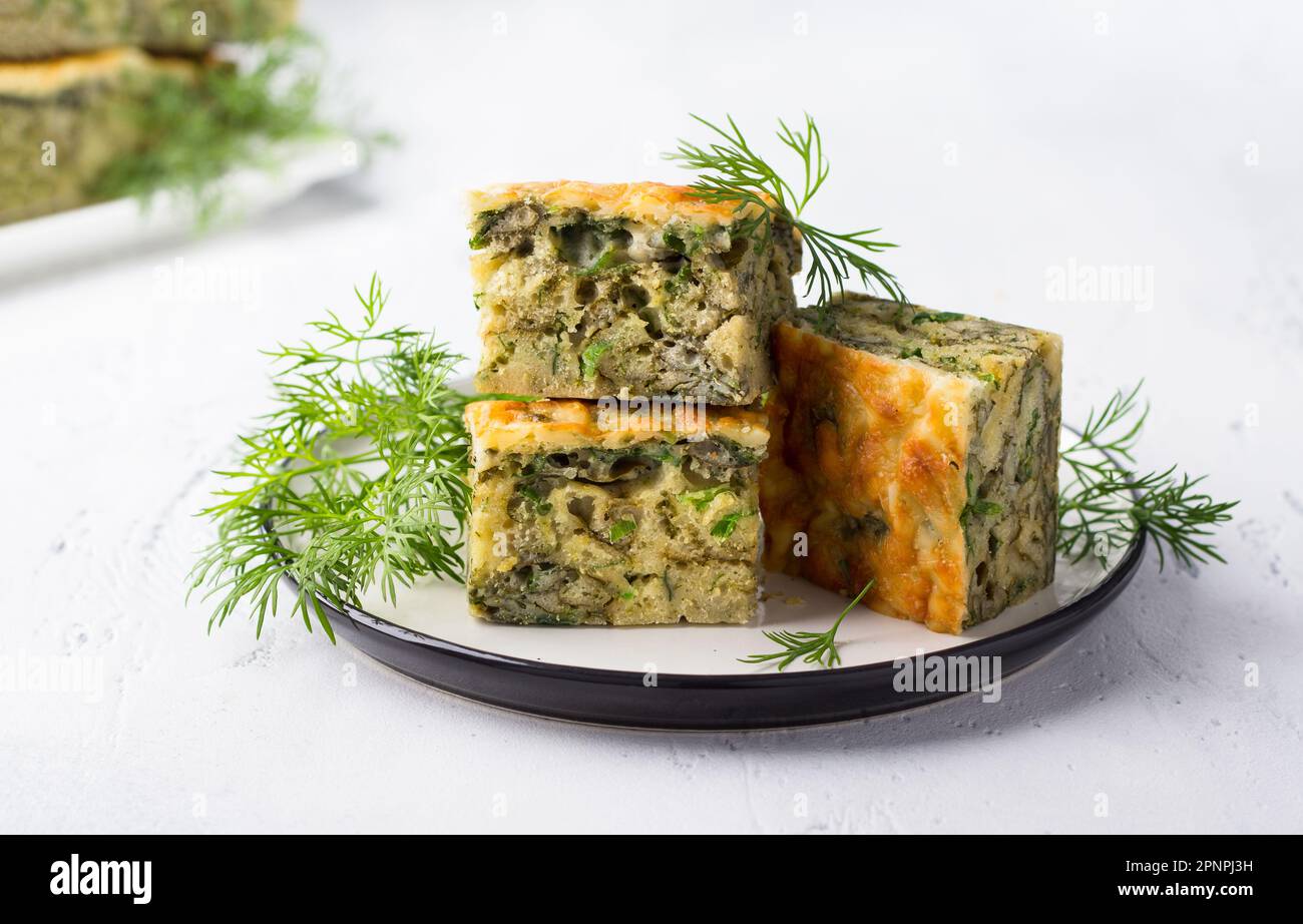 Delicious homemade pie with spinach, sorrel, green onions and cheese