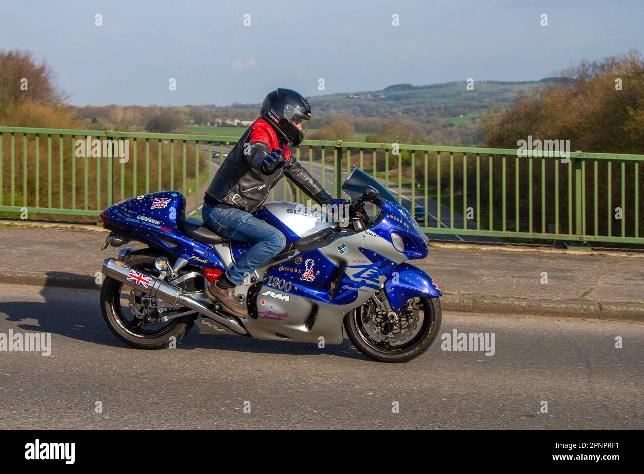 2000 Suzuki Gsx 1300 R Inline Four Blue Motorcycle Supersports Petrol Blue Motorcycle Supersports Petrol 1298 cc; crossing motorway bridge in Greater Manchester, UK Stock Photo