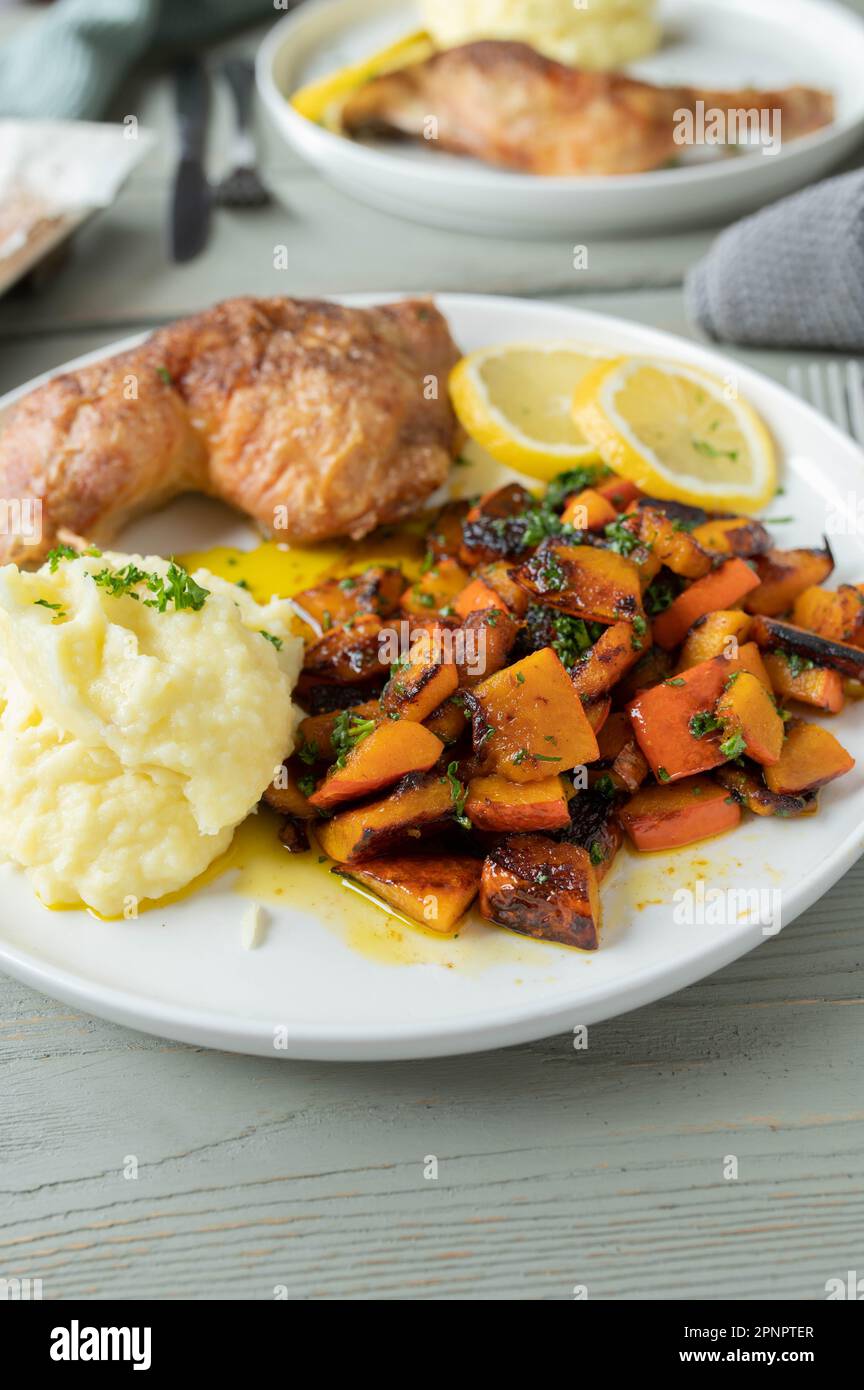 Gluten free dinner with oven baked chicken legs, mashed potatoes and