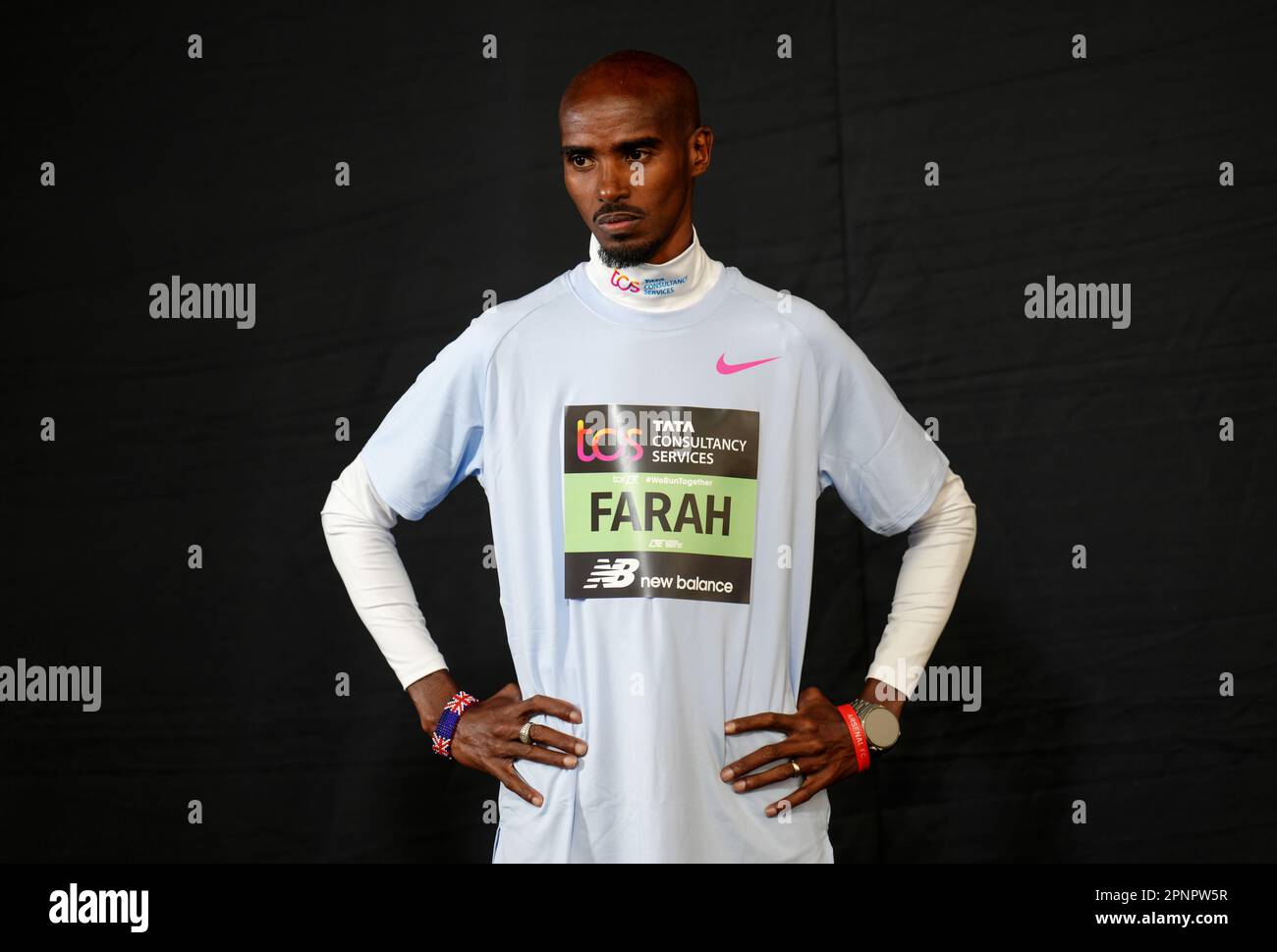 Sir Mo Farah, CBE poses for photographers during a press conference in