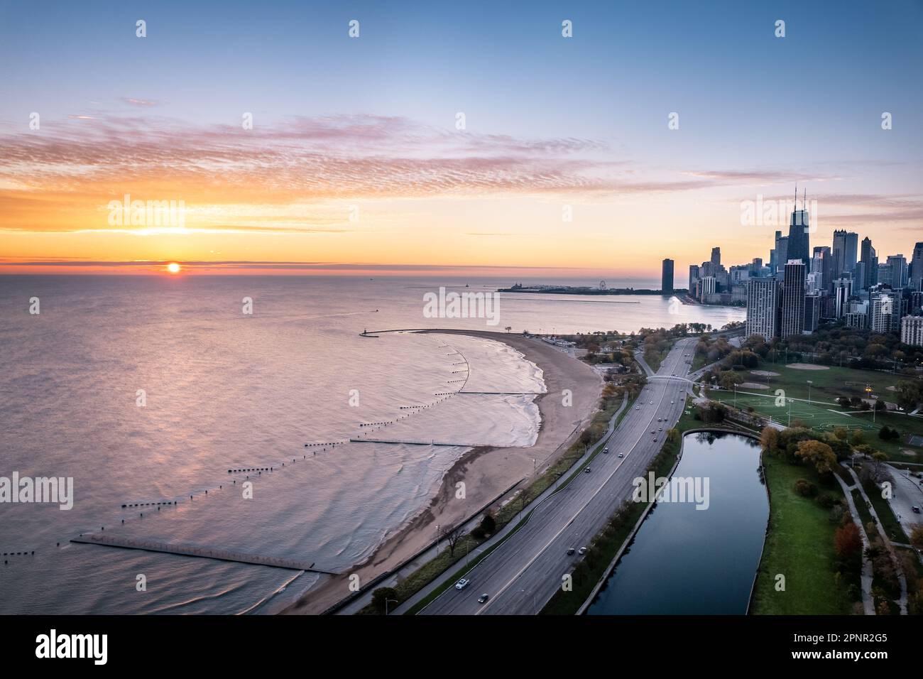 Aerial sunset view of Chicago Skyline and Lake Michigan with Lincoln ...