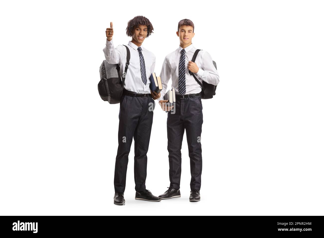 A caucasian and and african american male student in school uniforms