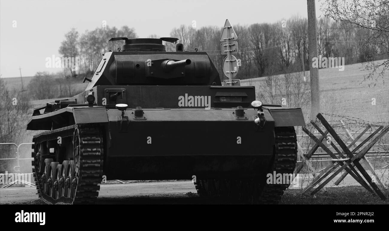German Wehrmacht Light Panzer Tank Moves Into Position. German Wehrmacht World War Ii Automotive. Armored Combat Tank. Reconstruction Of Battles World Stock Photo