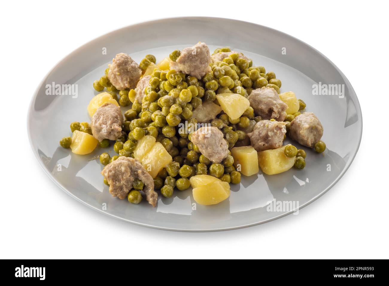Pea and potato stew with meatballs in dish isolated on white with