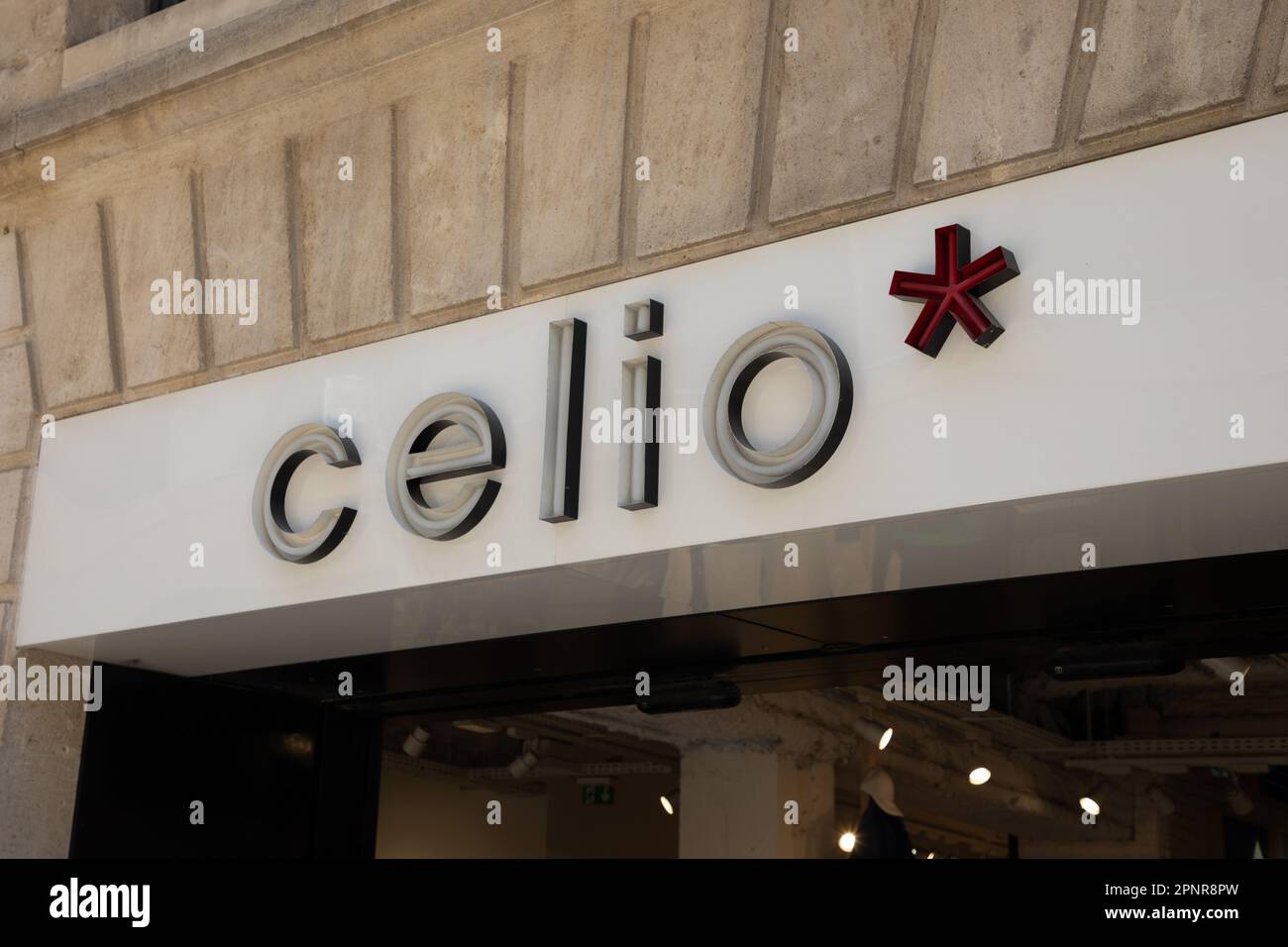 Bordeaux , Aquitaine France - 04 17 2023 : celio asterisk red cross sign  brand and text logo facade men clothing store entrance chain Stock Photo -  Alamy