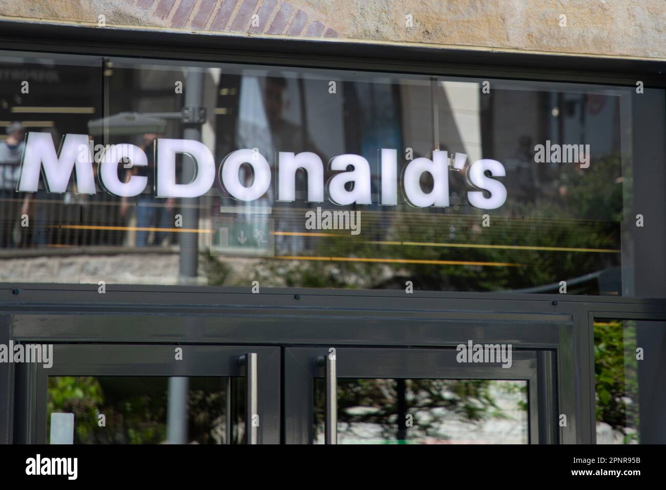 Bordeaux ,  Aquitaine France - 04 17 2023 : McDonald's sign text and brand logo on windows facade Restaurant Exterior of McDonalds fast food Stock Photo