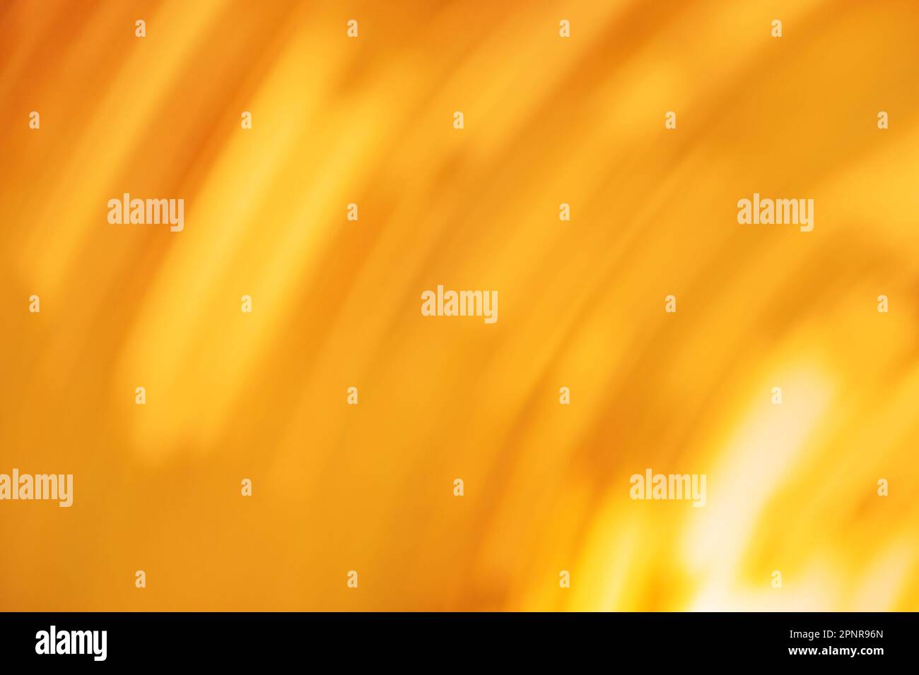 Gold yellow honeyed candied color wave effect abstract background. Blur melliferous honeyed background. Stock Photo