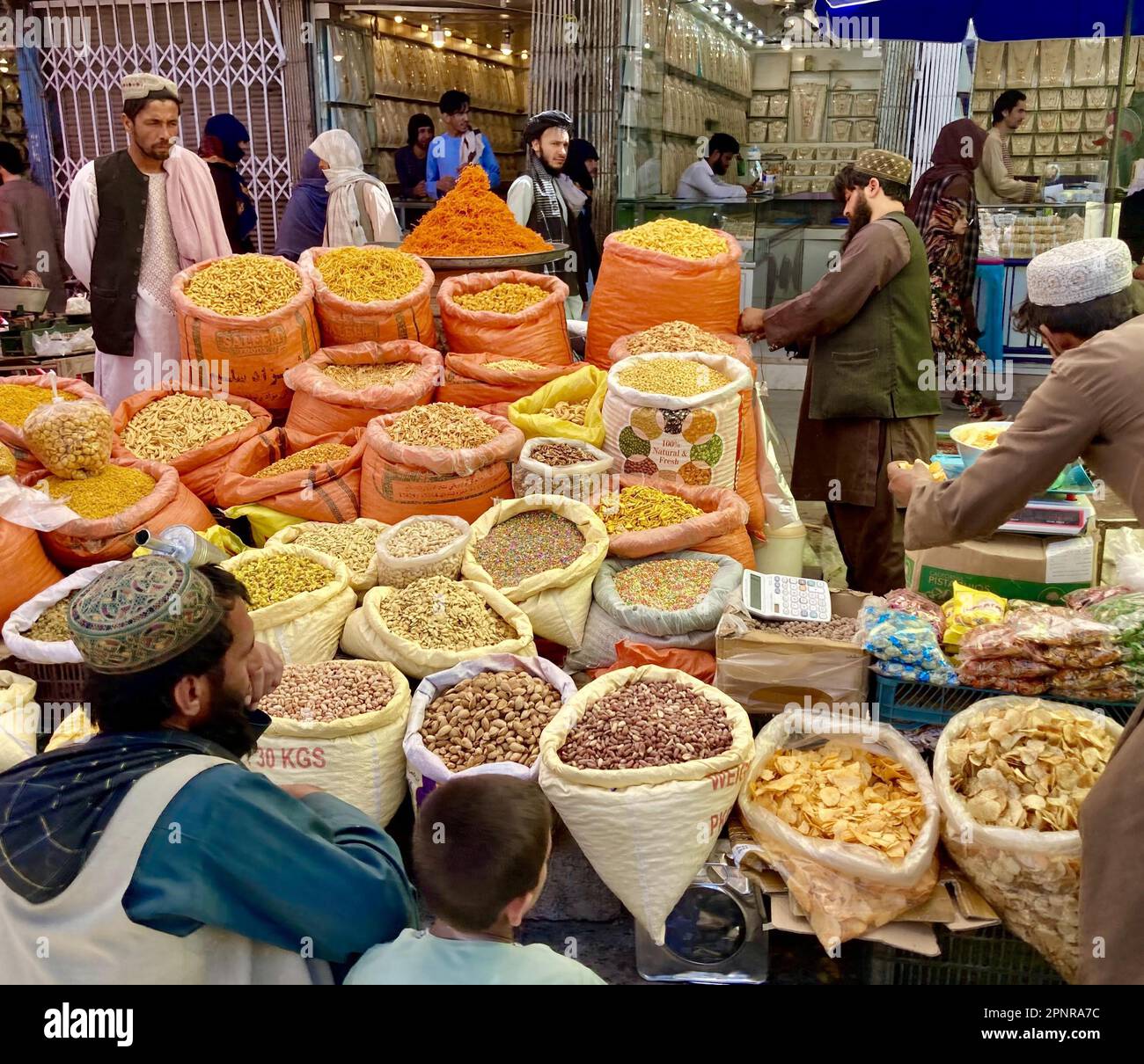 Kandahar, Afghanistan. 20th Apr, 2023. Afghan people buy dry fruits at