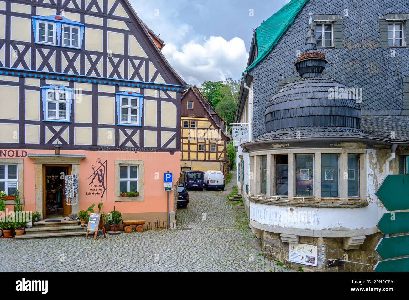 Listed historic buildings of the old Stadtapotheke and the former inn 'Am hohen Stein', Hohnstein, Saxon Switzerland, Saxony, Germany. Stock Photo