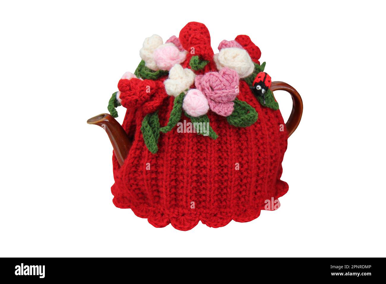 A Woollen Knitted Tea Cosy on a Teapot. Stock Photo