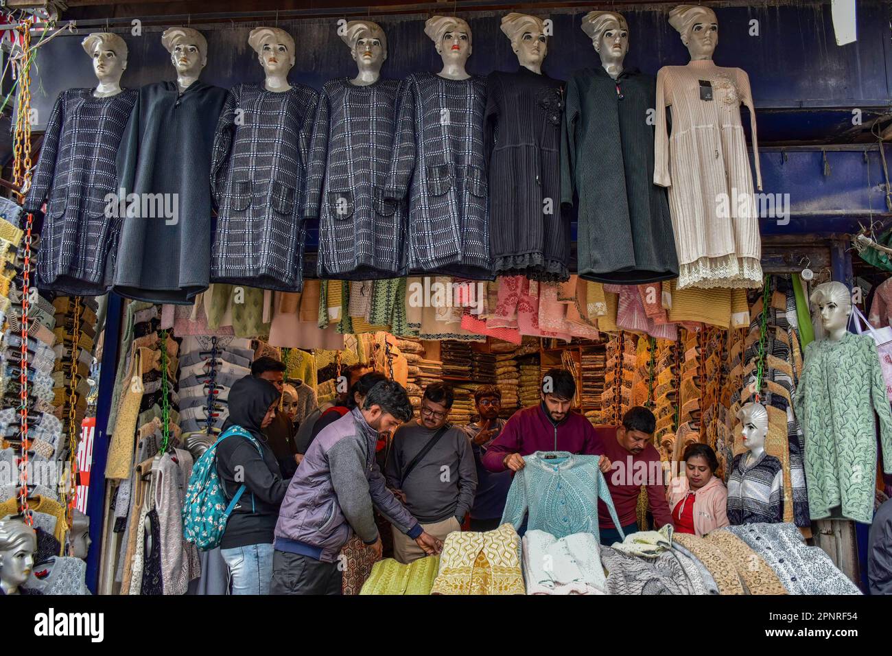Srinagar, India. 20th Apr, 2023. Kashmiri Muslims shop for clothes
