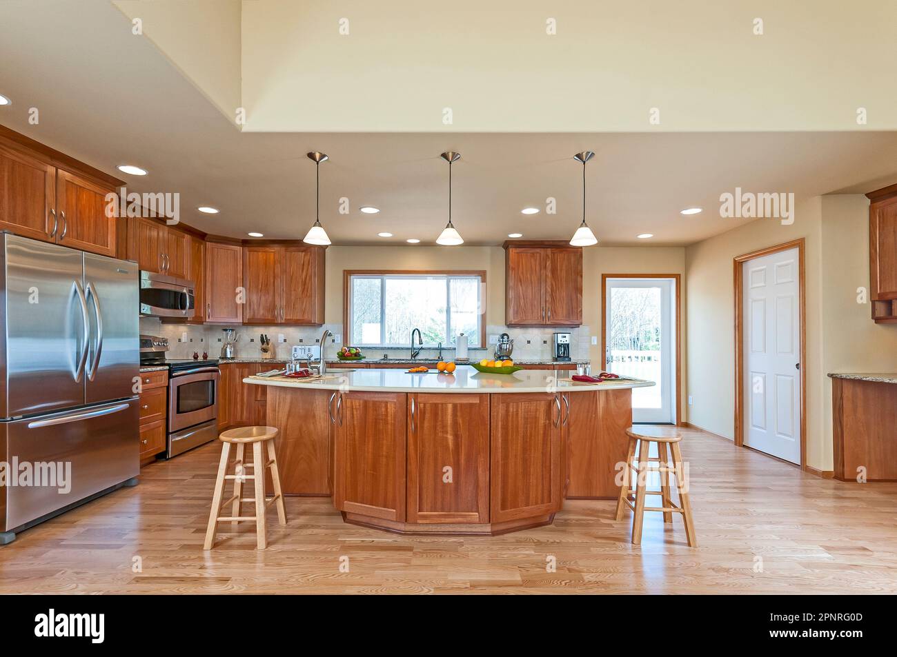 Wood countertop, and kitchen sink, on an island and hardwood