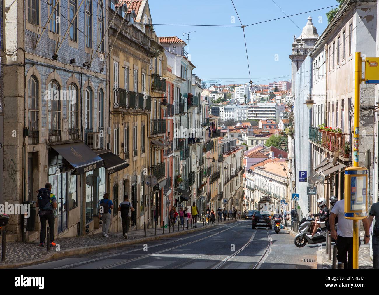 Lissabon, Portugal. 05th Apr, 2023. A Lisbon streetcar on line 28 moves away from the Santa Catarina stop through the Bairro Alto district. Credit: Viola Lopes/dpa/Alamy Live News Stock Photo