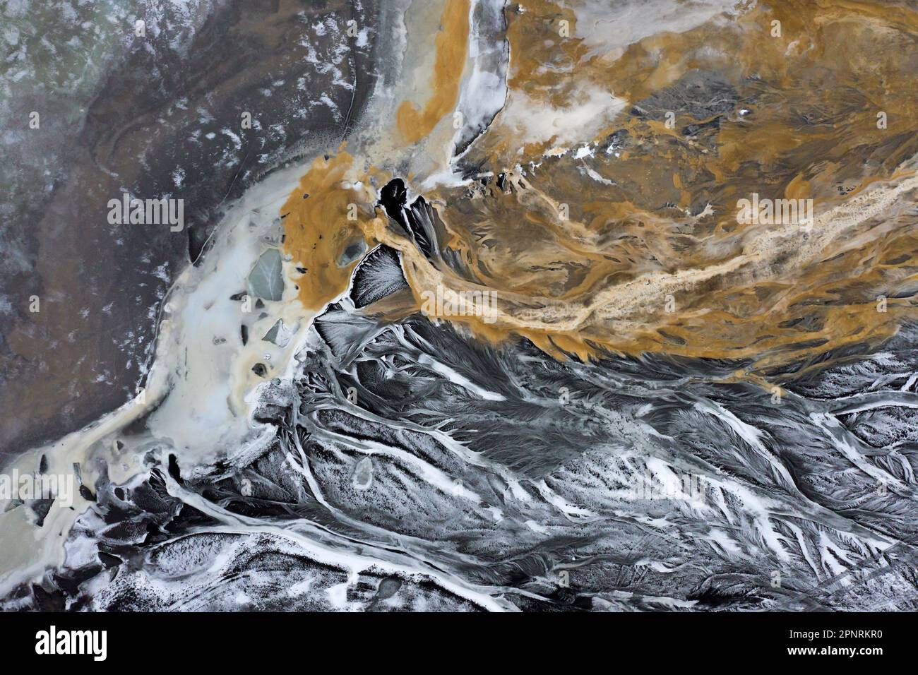 Aerial view over the glacial Virkisá River basin along the Glacier Falljökull in winter in Austurland, part of Vatnajökull, largest ice cap in Iceland Stock Photo