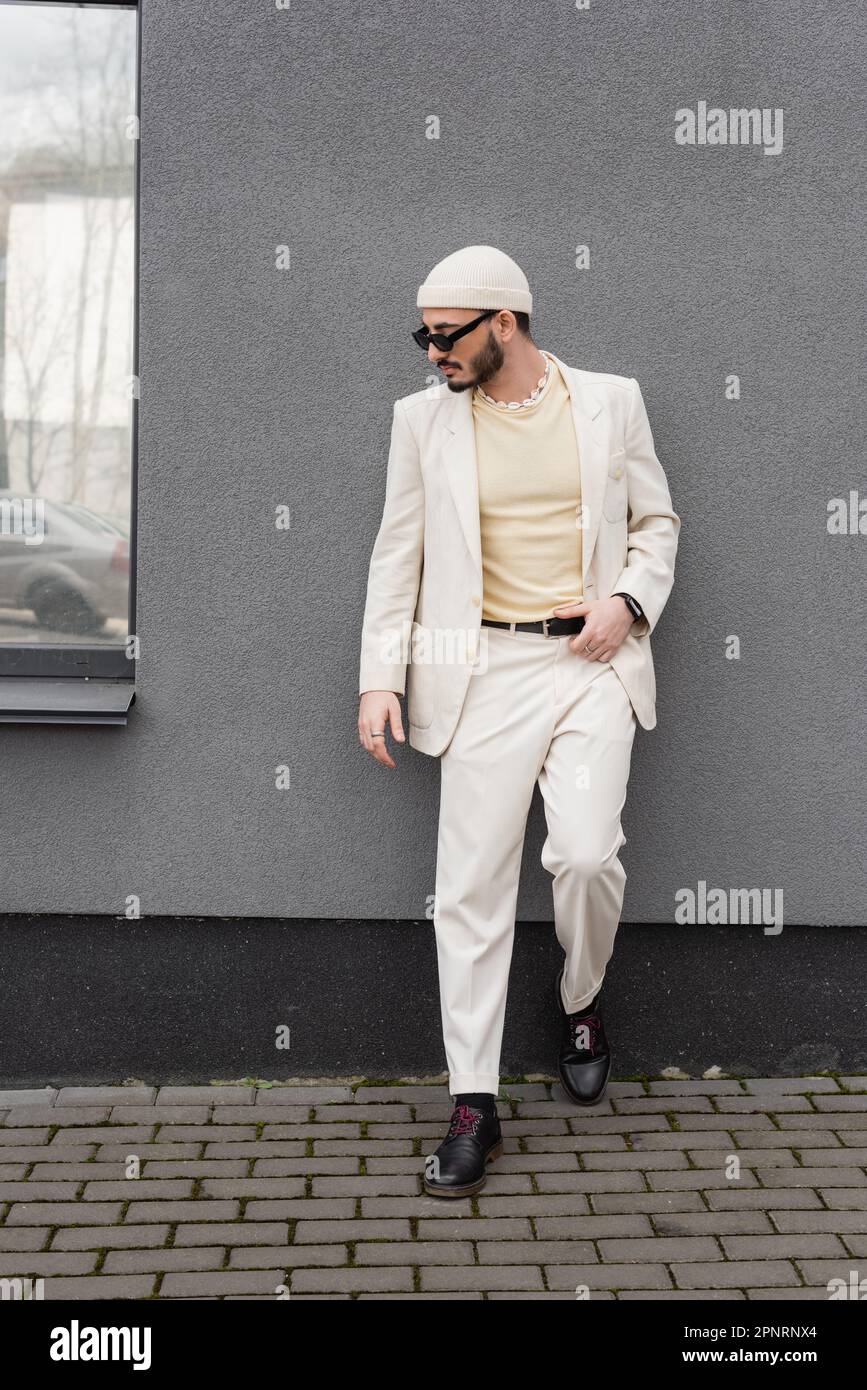 Man dressed in beige hi-res stock photography and images - Alamy