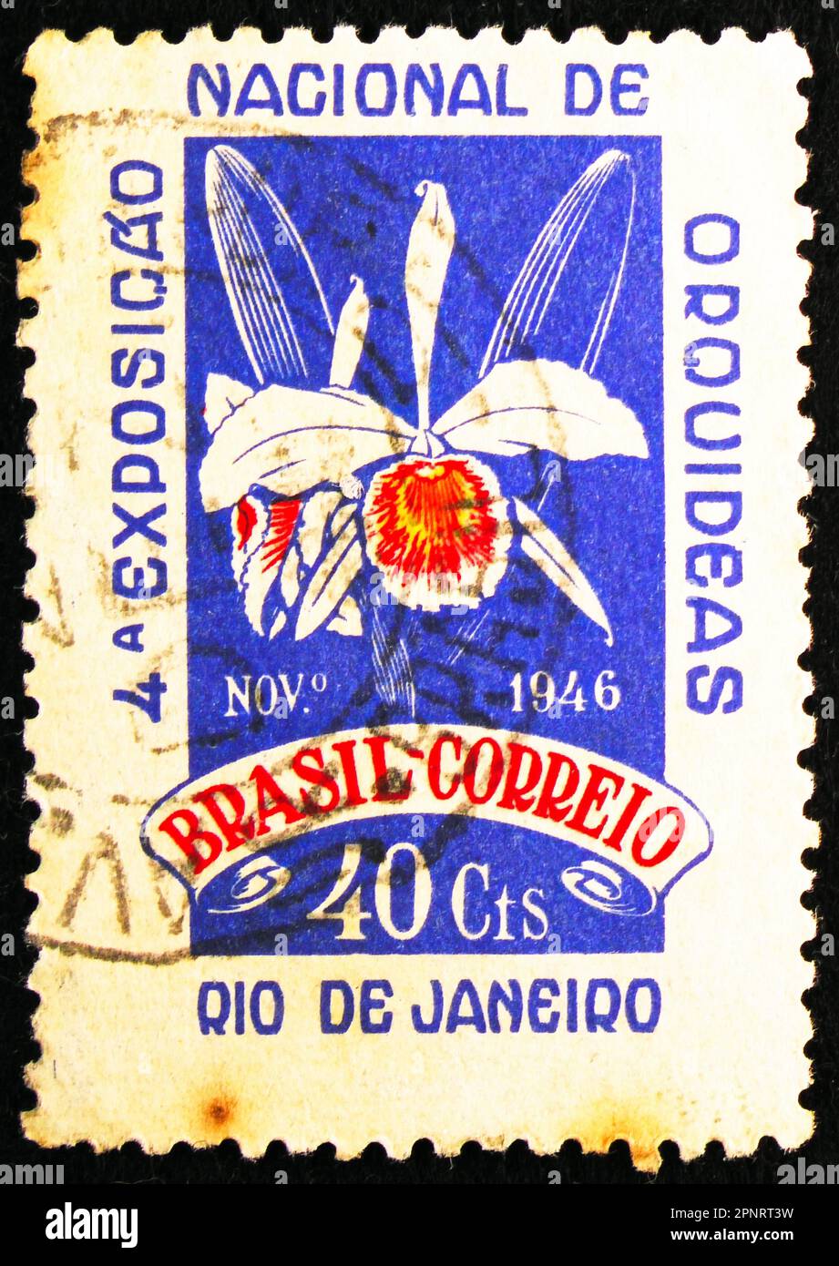 MOSCOW, RUSSIA - MARCH 26, 2023: Postage stamp printed in Brazil shows Cattleya purpurata, 4th National Orchid Exhibition serie, circa 1946 Stock Photo