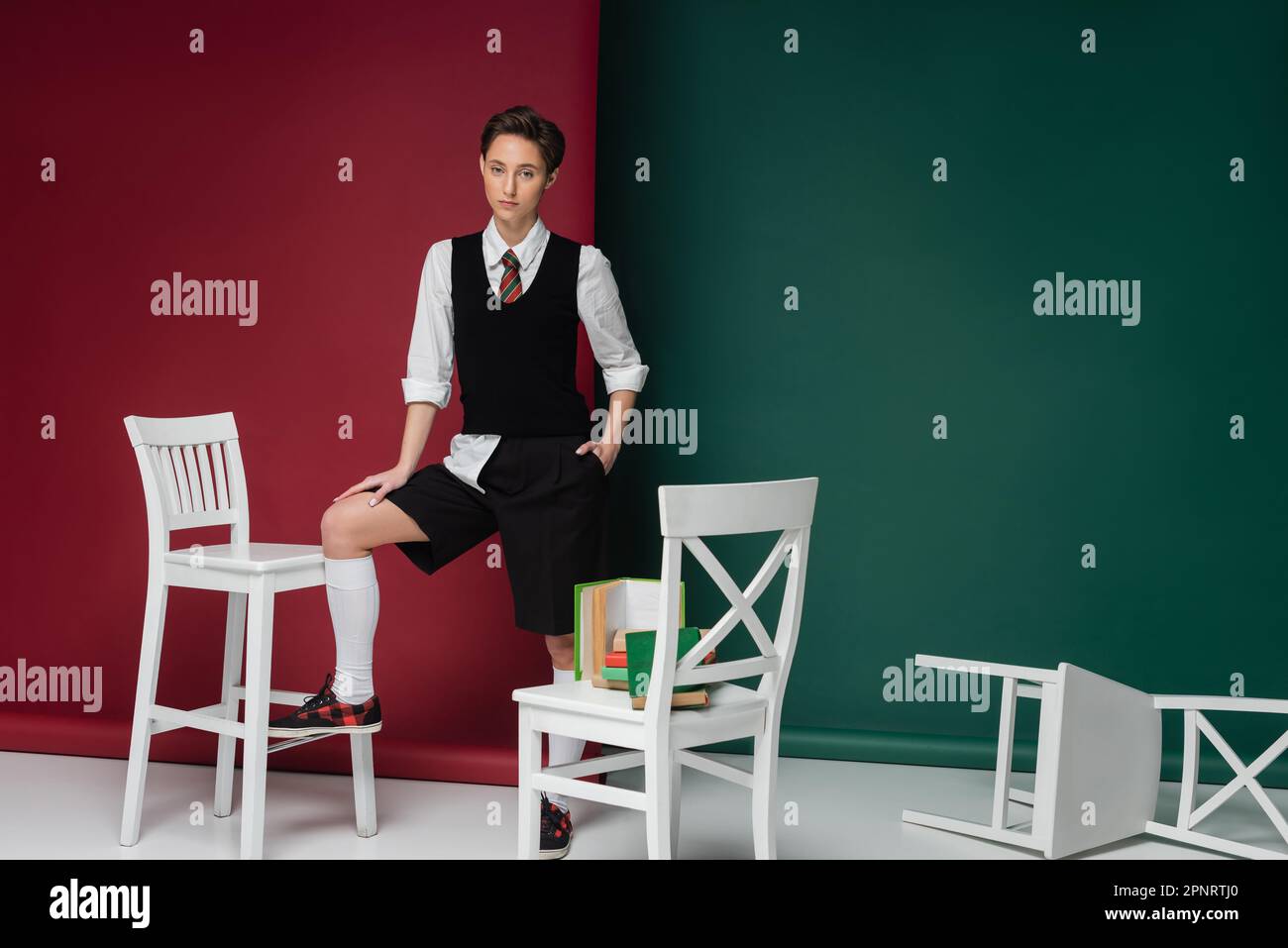 Adult dressed in school uniform hi-res stock photography and images - Alamy