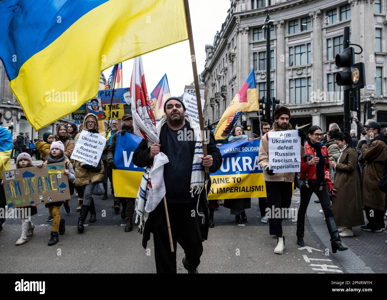 A small counter protest in support of arming Ukraine tried to interupt the main  Stop the War coalition protest in London 25 Feb 2023 Stock Photo