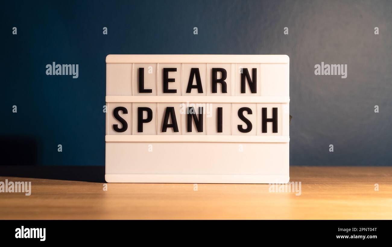 Learning language concept Learning Spanish word on white letter board Learning language concept Learning Spanish word on white letter board