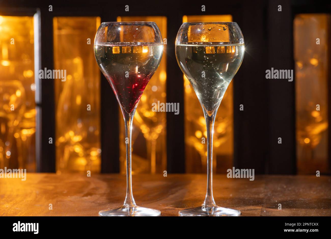 Drinking of Kir Royal, French aperitif cocktail made from creme de