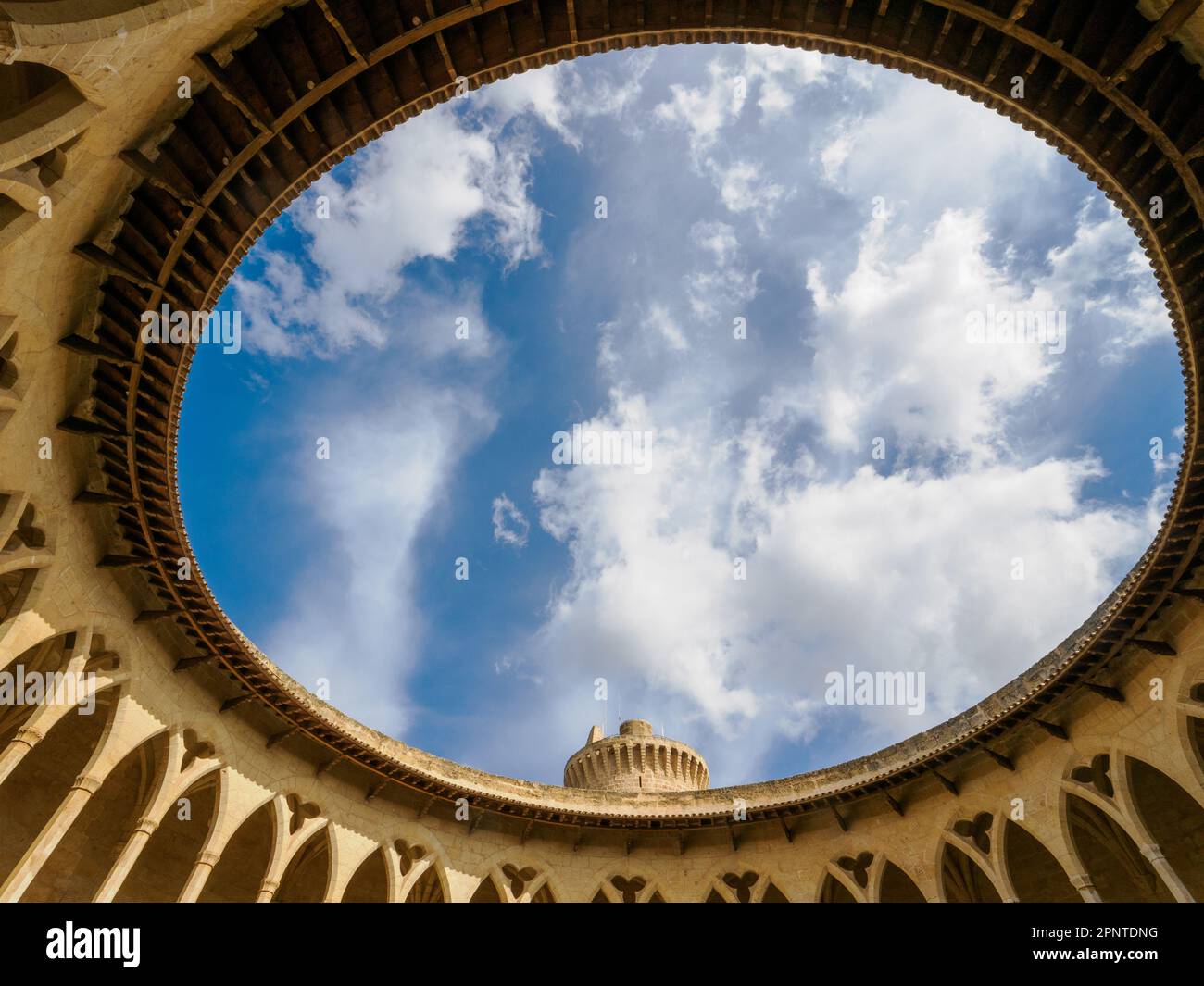 Gothic arched central courtyard of Bellver Castle the Castillo de Bellver high on a hill overlooking Palma de Majorca in the Balearic Islands of Spain Stock Photo
