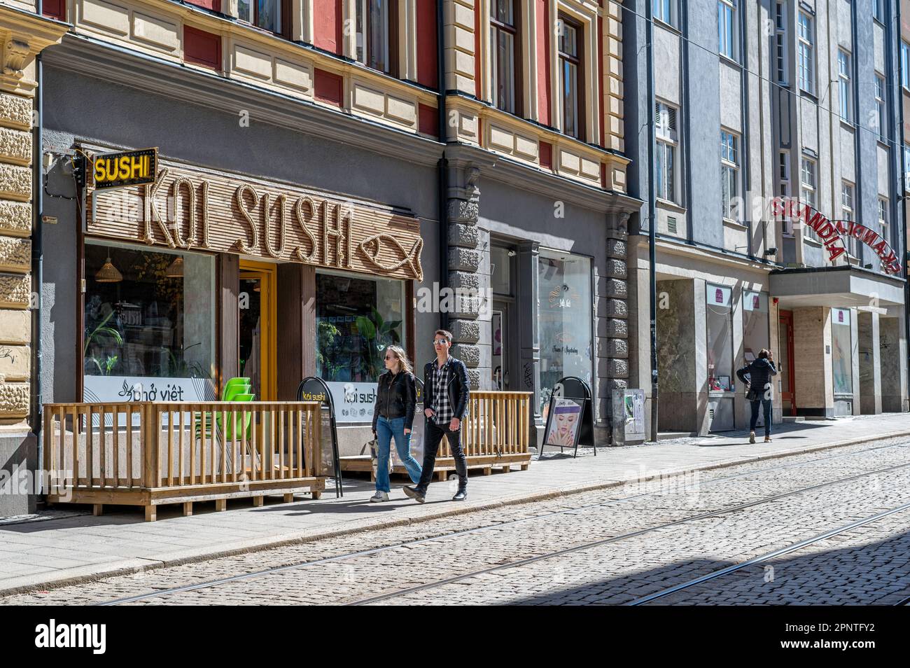 Main street Drottninggatan during spring in the city centre of Norrkoping, Sweden. Norrkoping is a historic industrial town Stock Photo