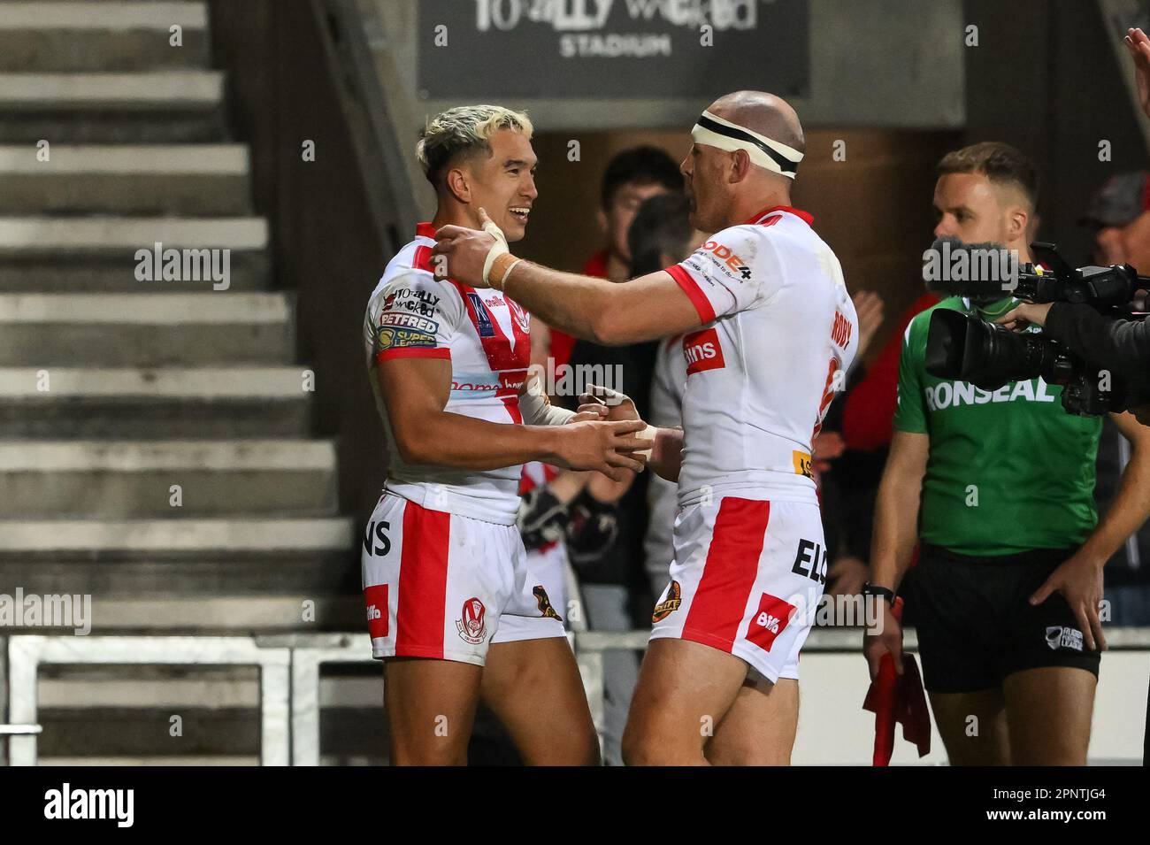 Tee Ritson #25 of St Helens goes over for a try during the Betfred ...