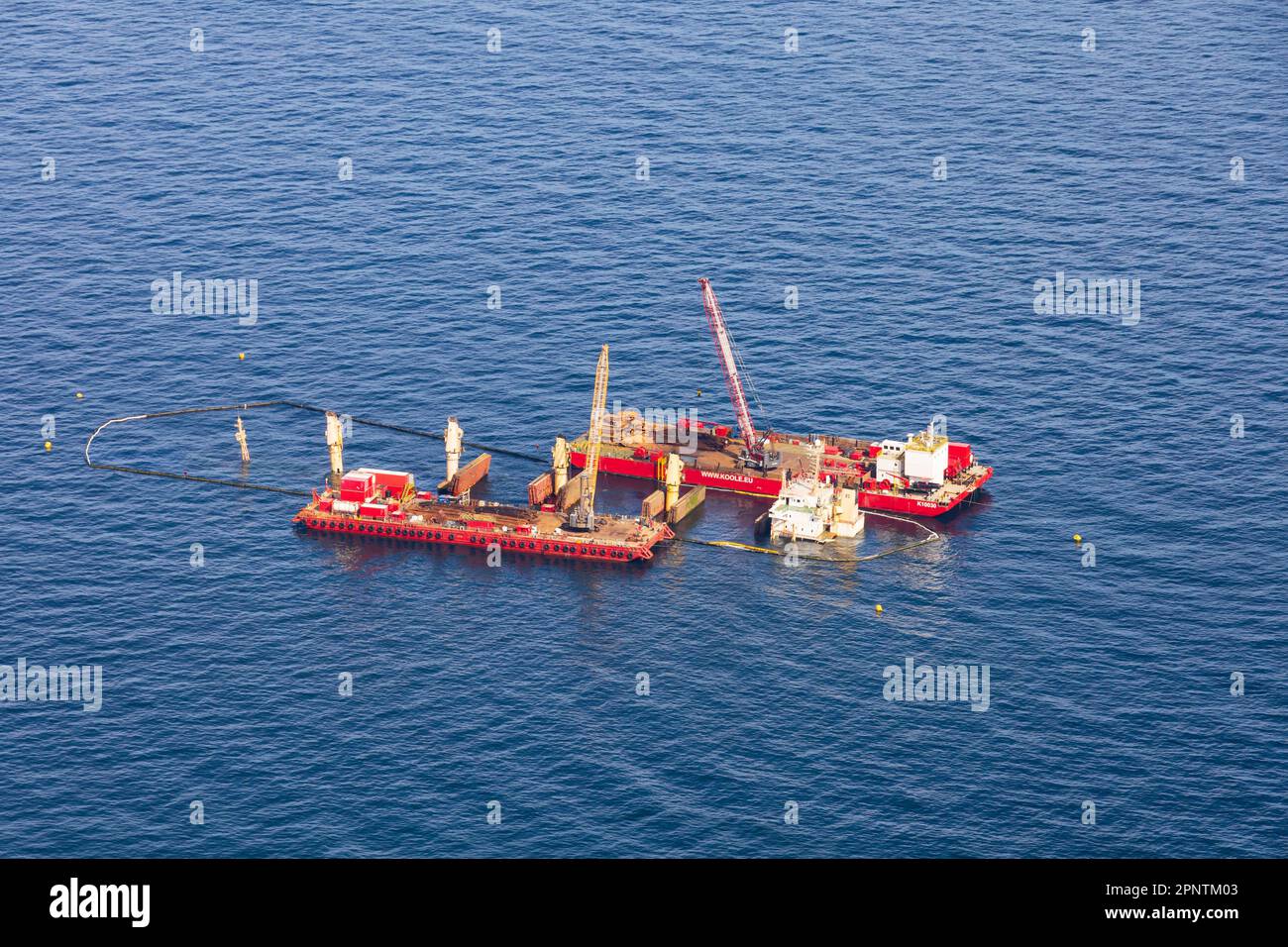 Salvage operation to raise the wreck of bulker OS35 by Koole EU. Catalan Bay, The British Overseas Territory of Gibraltar, the Rock of Gibraltar on th Stock Photo