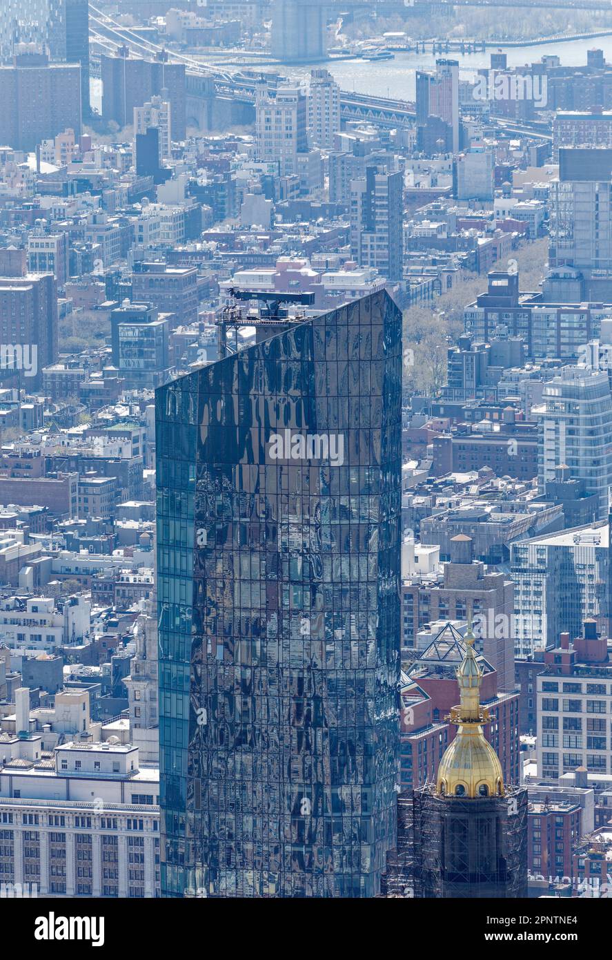 The top of glass-faced Madison Square Park Tower is wider than its granite base; the residential high-rise is two blocks from the park it’s named for. Stock Photo