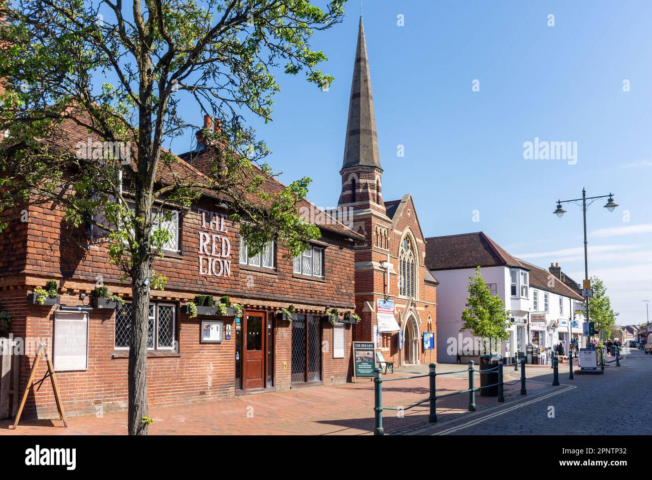 The Red Lion Pub and United Church of Egham, High Street, Egham, Surrey, England, United Kingdom Stock Photo