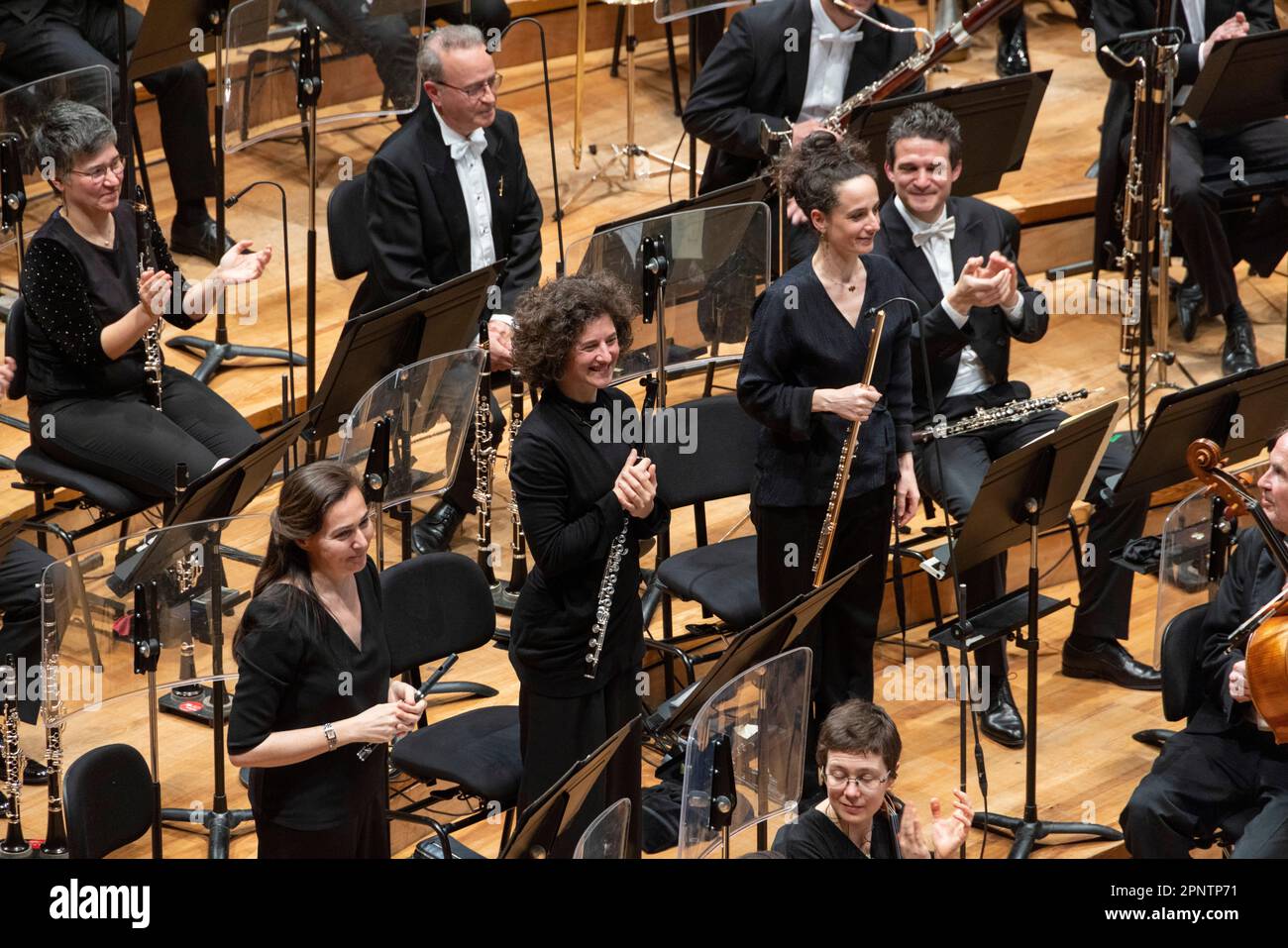 flute section taking bow, classical concert, Philharmonie de Paris concert hall, Paris, France Stock Photo