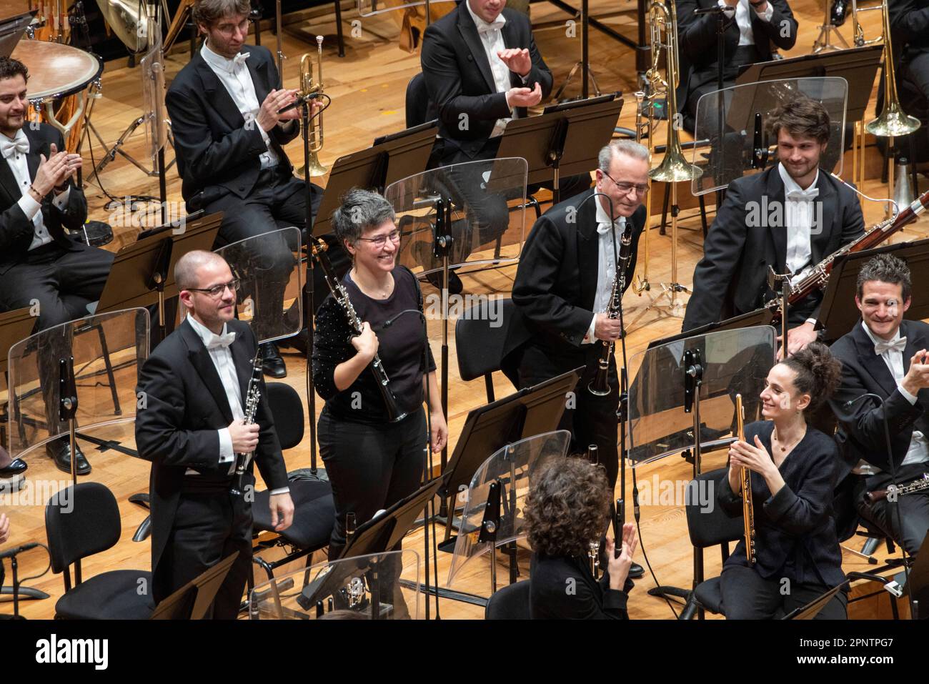 clarinet  section standing for applause, classical concert, Philharmonie de Paris concert hall, Paris, France Stock Photo
