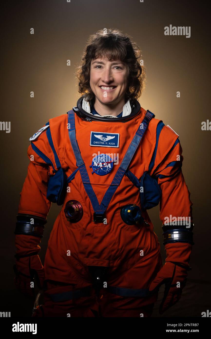 Houston, United States. 28 March, 2023.  NASA Astronaut Christina Hammock Koch and Artemis II crew member poses in the bright orange Orion Crew Survival System suit at the Johnson Space Center, March 28, 2023 in Houston, Texas. Koch was selected as a flight engineer for the Artemis II mission to the Moon.  Credit: Robert Markowitz/NASA/Alamy Live News Stock Photo