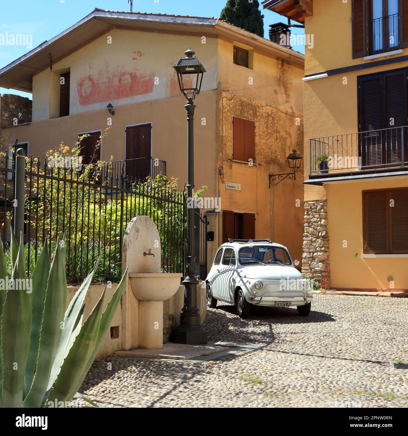 Classic car Fiat 500 L inside Castle of Moniga. Castello di Moniga del Garda. Stock Photo