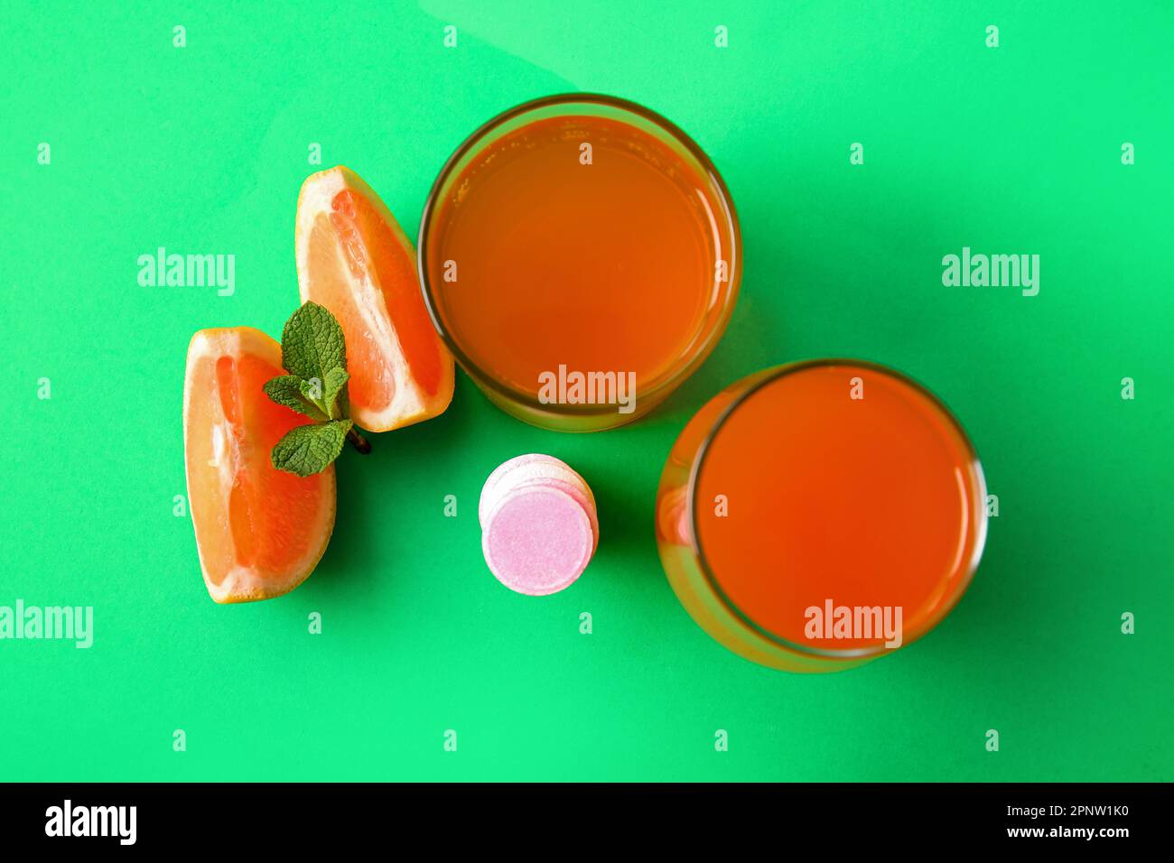Glasses of vitamin C effervescent tablet dissolved in water and