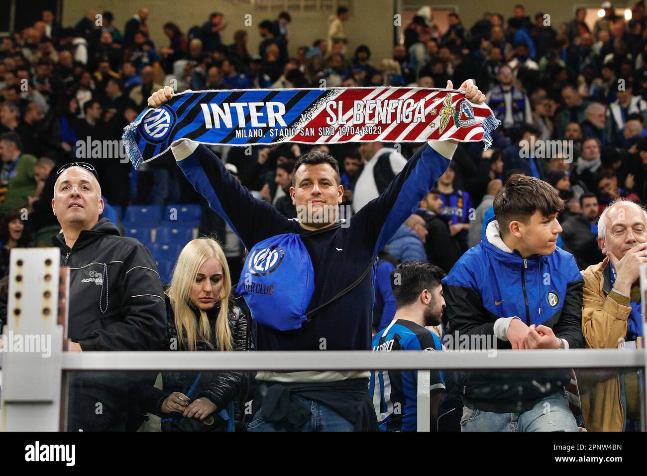 Milan, Italy. 19th Apr, 2023 FC Inter fan shows in the stands the scarf of the match at the end of soccer game FC INTER vs SL BENFICA, QF 2st leg UCL 2022-2023 San Siro stadium (Photo by Fabrizio Andrea Bertani/Pacific Press) Credit: Pacific Press Media Production Corp./Alamy Live News Stock Photo