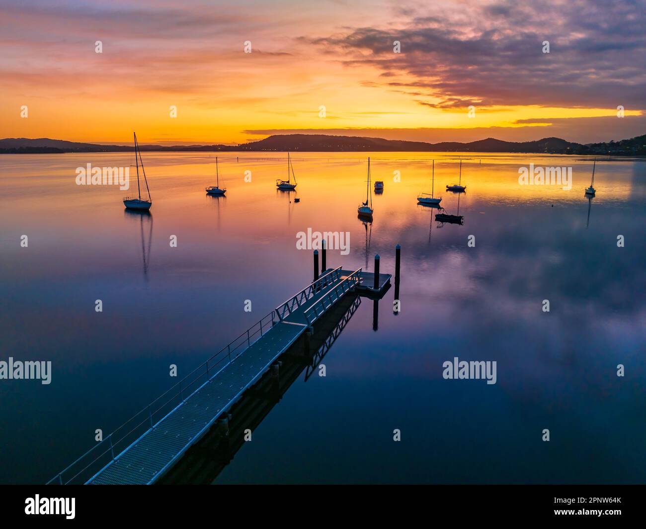 Sunrise over Brisbane Water at Couche Park, Koolewong on the Central Coast, NSW, Australia. Stock Photo