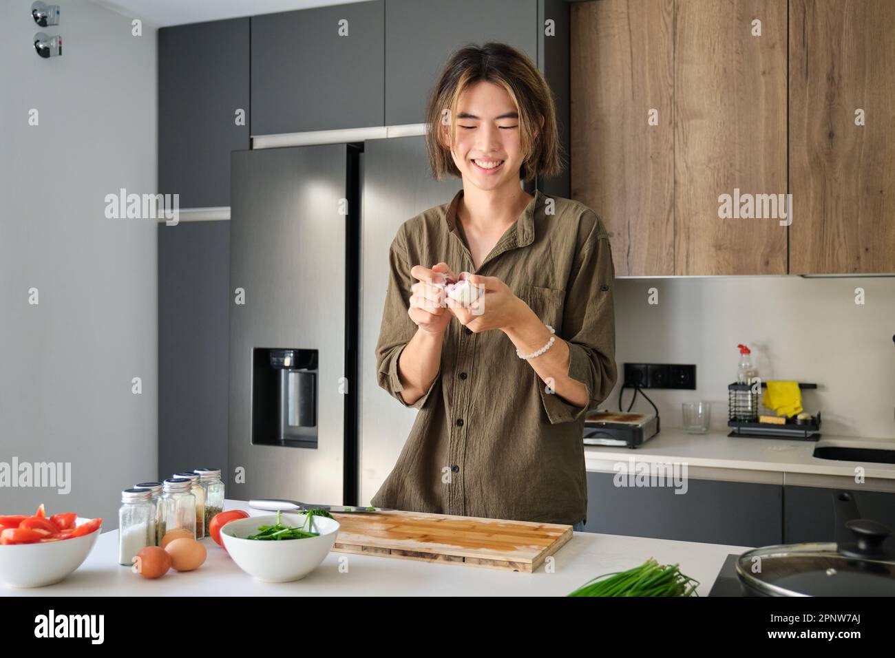 Asian young man peeling hi-res stock photography and images - Alamy