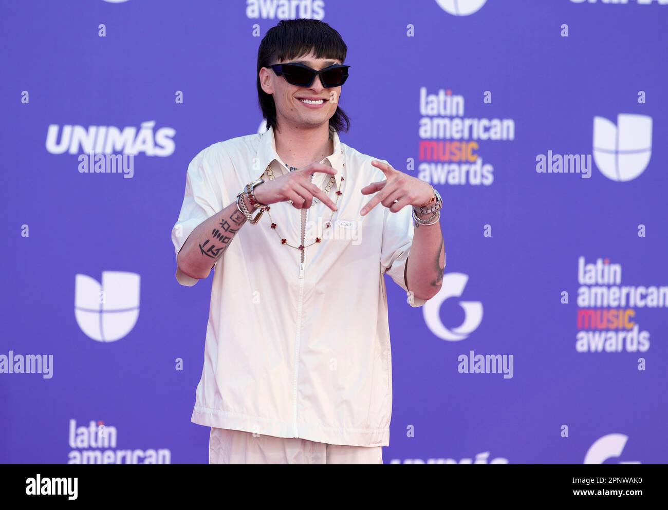 Peso Pluma arrives at the Latin American Music Awards on Thursday
