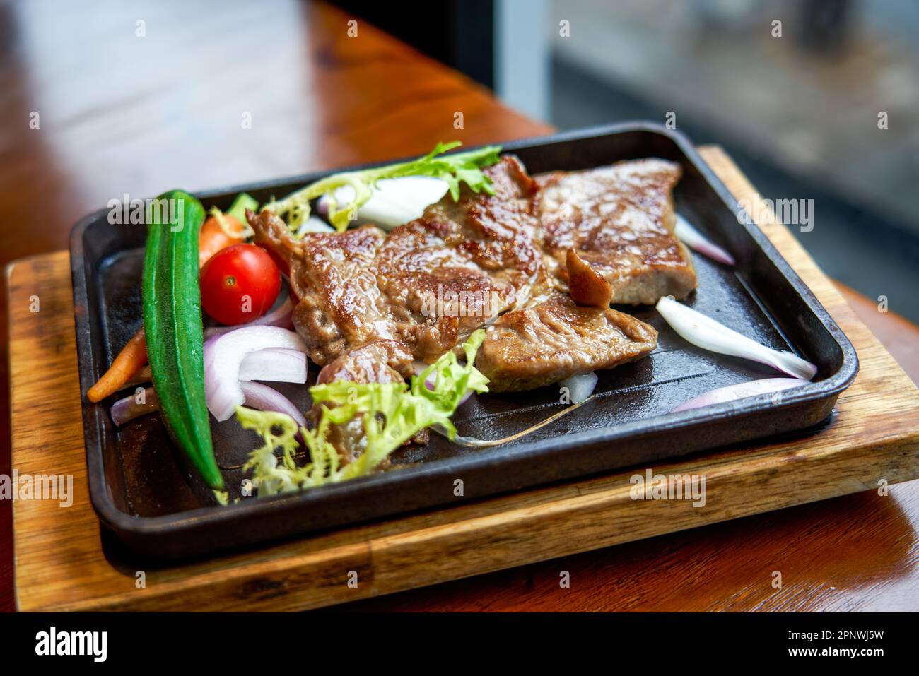 A delicious ribeye steak in a western restaurant Stock Photo Alamy
